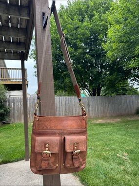 Mo & Co brown distressed leather crossbody bag